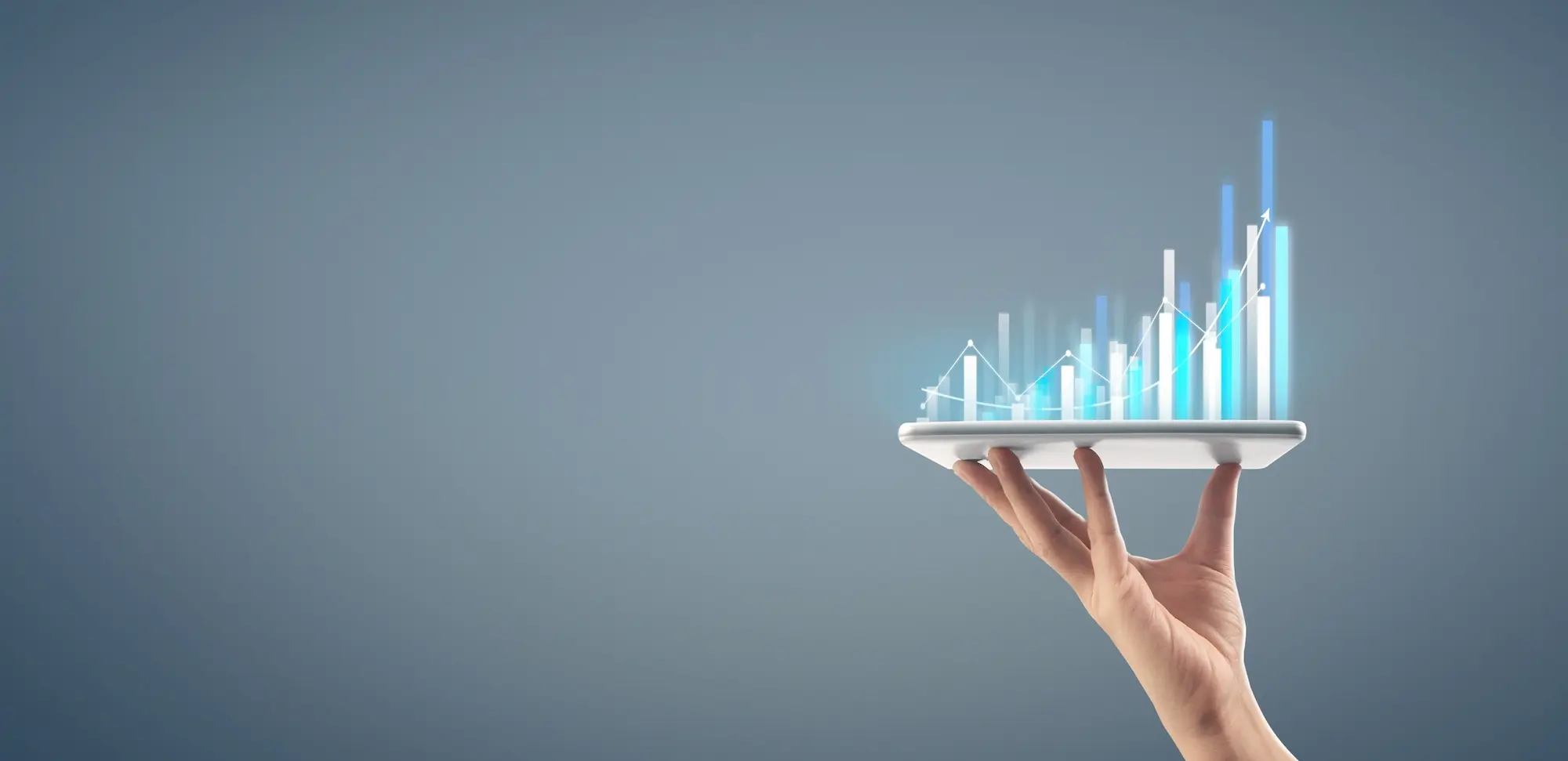 Graph growth and increase of chart positive indicators in his business,tablet in hand